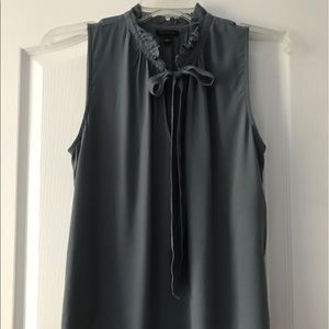 Ann Taylor sleeveless blouse with tie.
